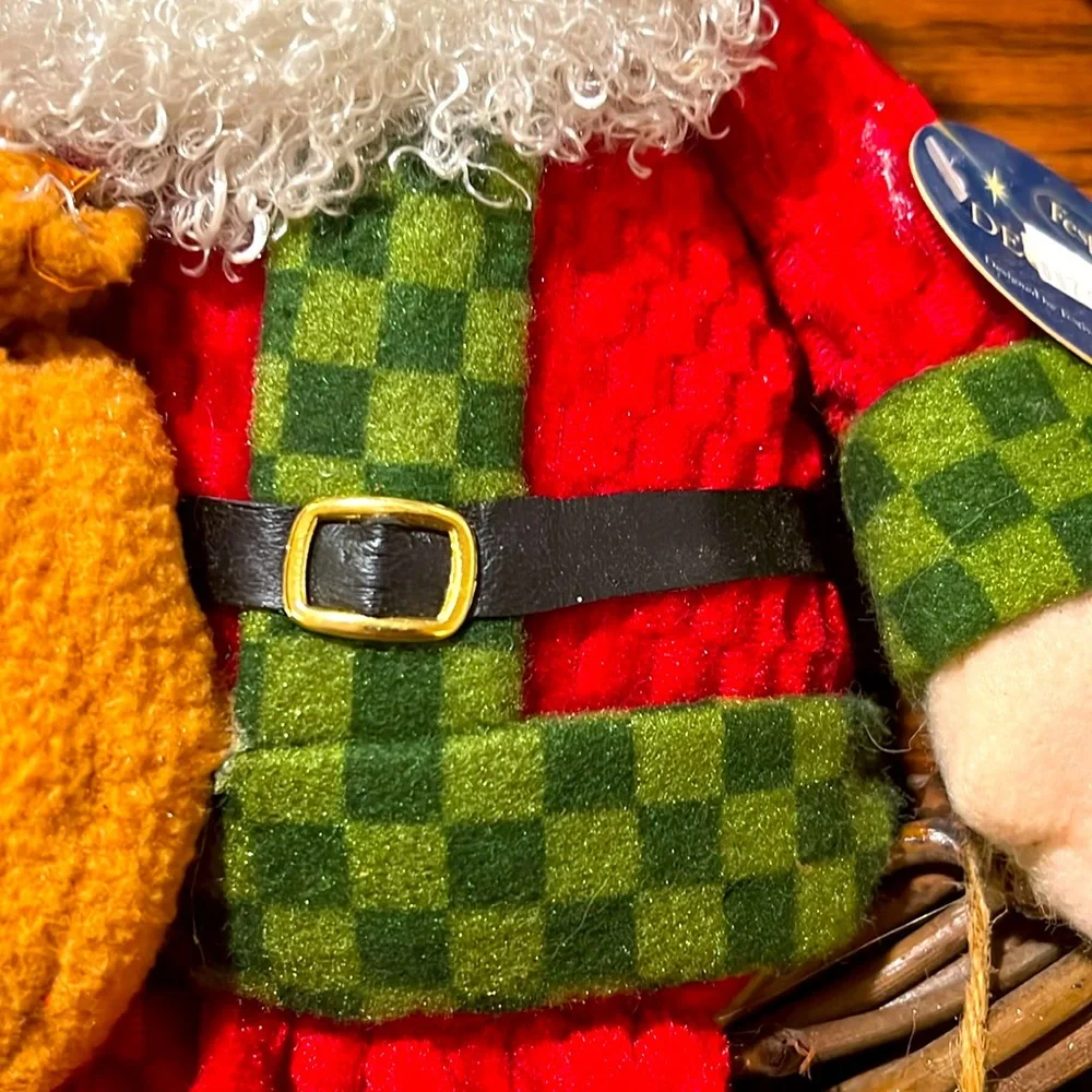 Festive. Merry Christmas. Sitting Santa Claus on the Wooden Bench.